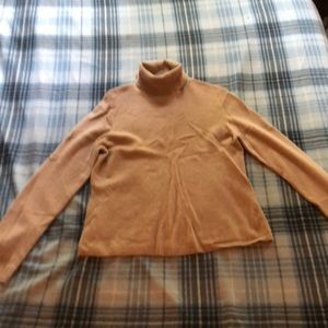Tan turtle neck sweater. 100% Cashmere
